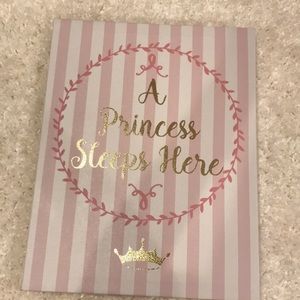 “A princess sleeps here” wall decor